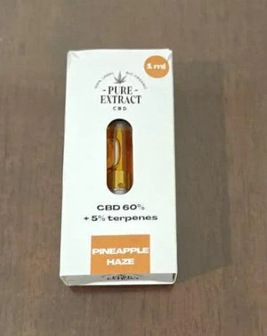 Pure Extract Pineapple Haze CBD cartridge 1ml with 60% CBD and 5% terpenes in box, close-up