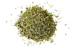 Dried skullcap herb loose leaf blend on white background, natural wellness product