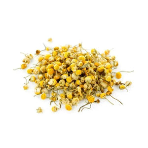 chamomile flowers for herbal tea and wellness use on white background