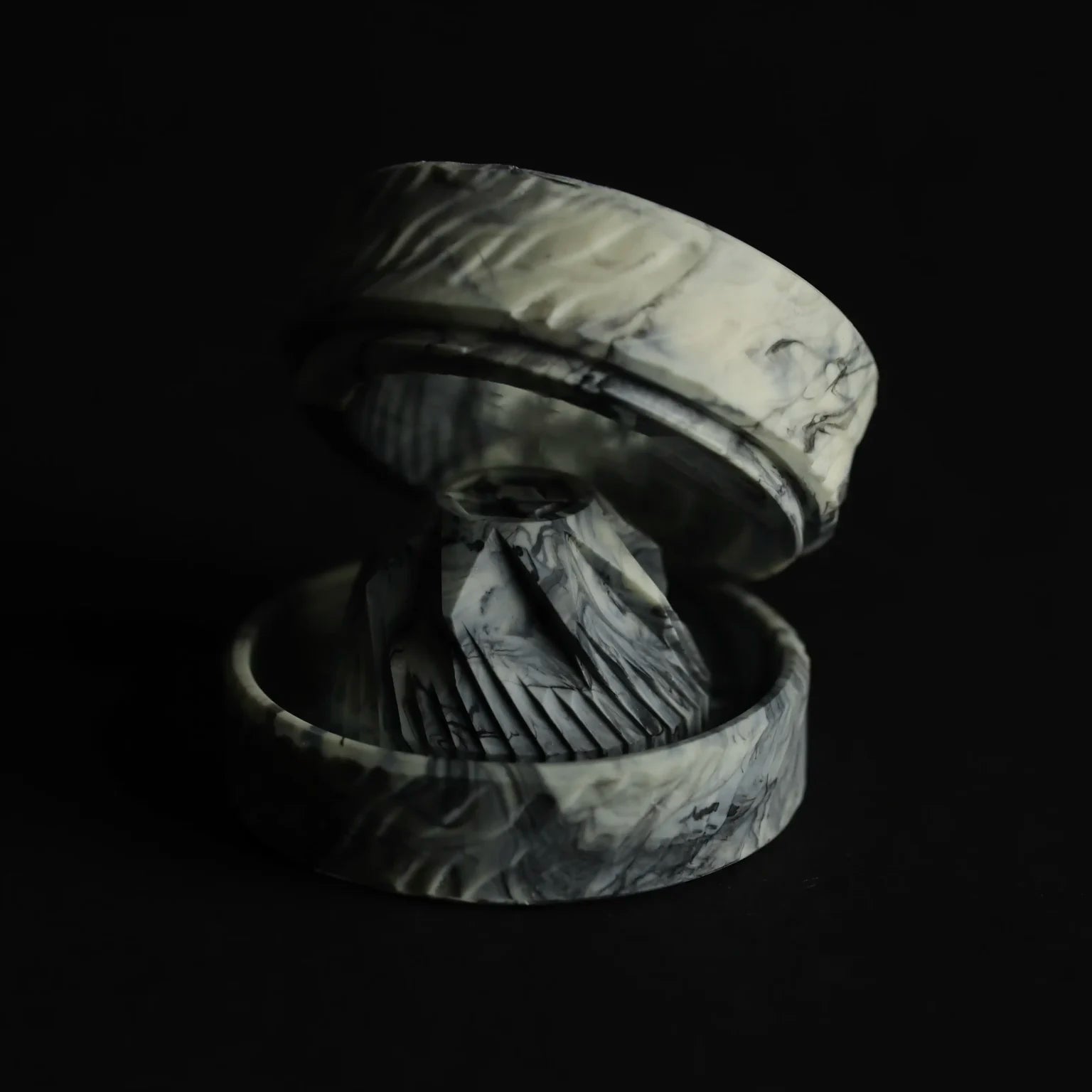 Black Marble Hash Grinder V3.0 – Durable & Stylish Hash Grinder displayed sideways