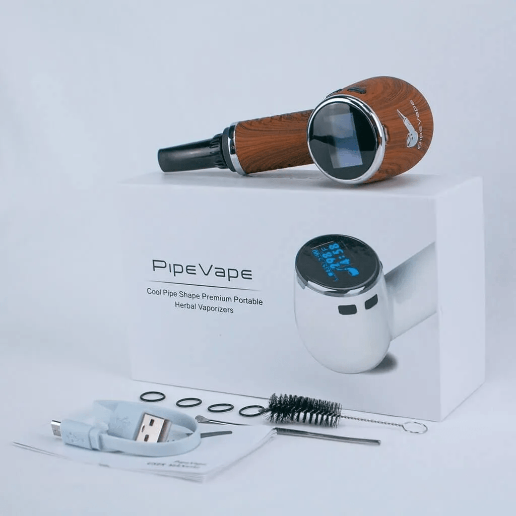 1 pipe vape, with branded packaging and contents which come with pipevape laid out in front of the box, these include the booklet, the charger, a cleaning brush, poking tool and several o rings